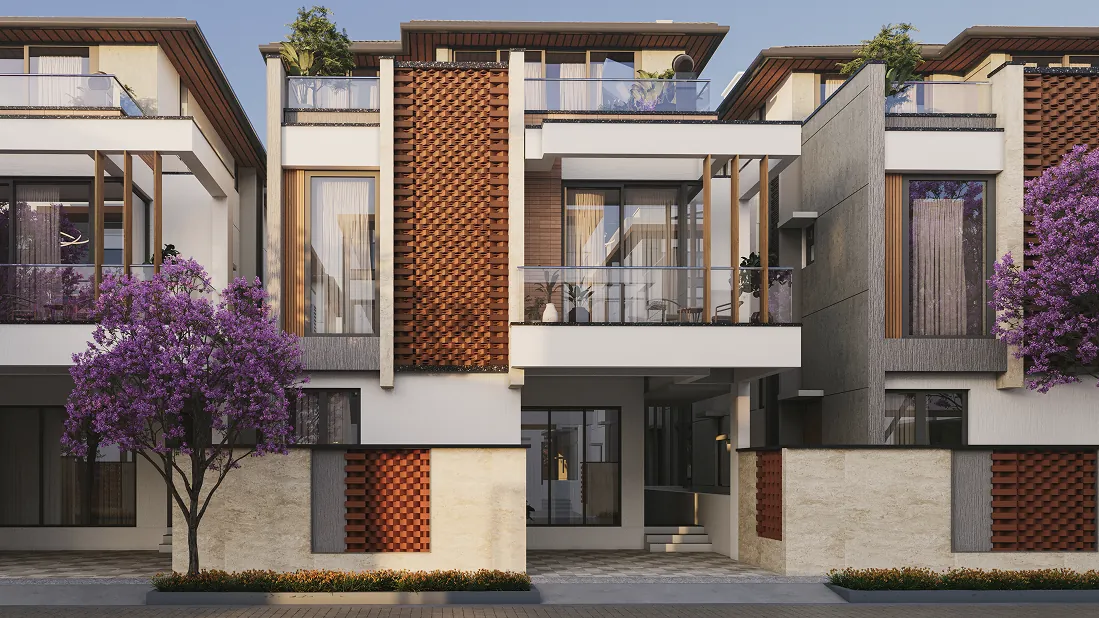 Evening view of illuminated villa exteriors at Valby Ira community